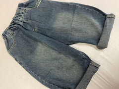 Folded view of blue Korean denim pants showing fabric finish by Little Aangan