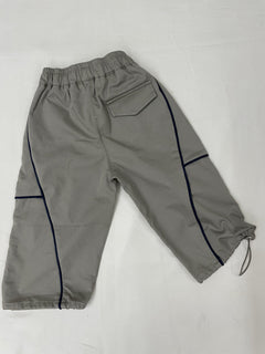 Front view of green drop crotch pants for kids by Little Aangan