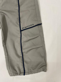 Side detail of green drop crotch pants for kids by Little Aangan