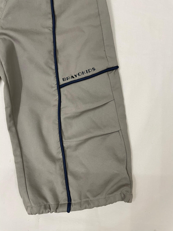 Side detail of green drop crotch pants for kids by Little Aangan